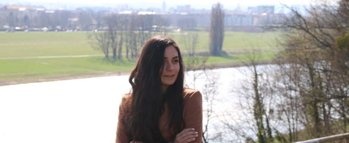 Our teacher Caro standing by a river